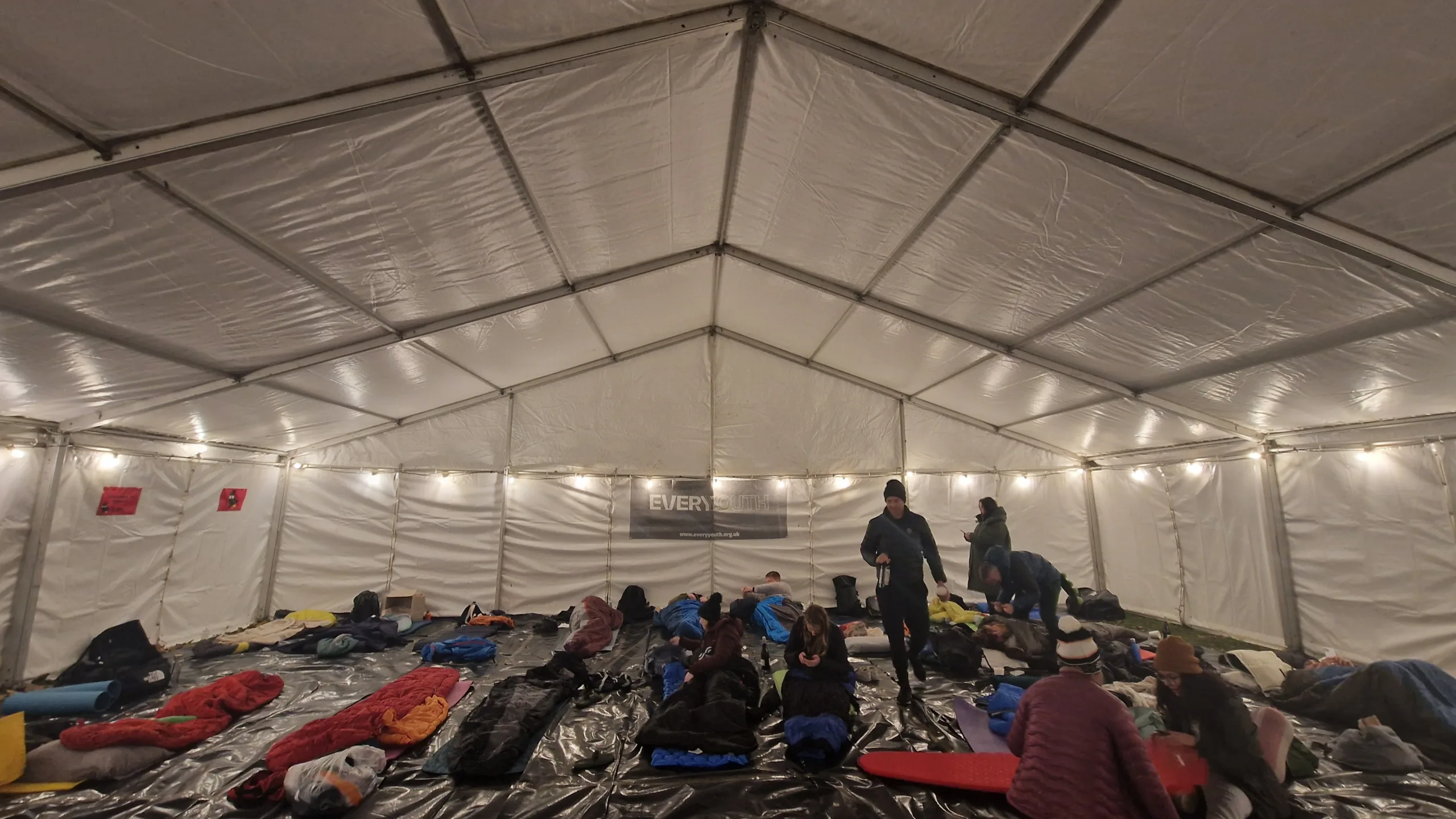 people sleeping in a tent